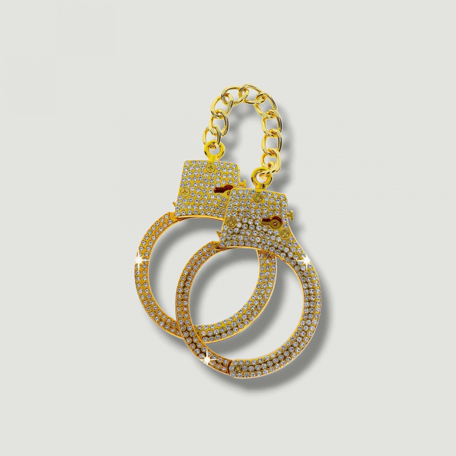 Złote kajdanki z kryształkami