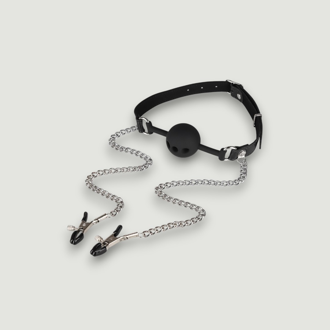 Knebel do ust z zaciskami na sutki